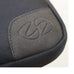 The full-grain, Premium Leather black "vintage" corner detail on the MacCase Accessory Pouch