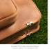 The bottom feet of the MacCase leather briefcase backpack