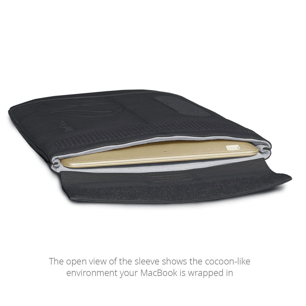Open view of the MacCase Premium Leather Sleeve shown with a MacBook Air