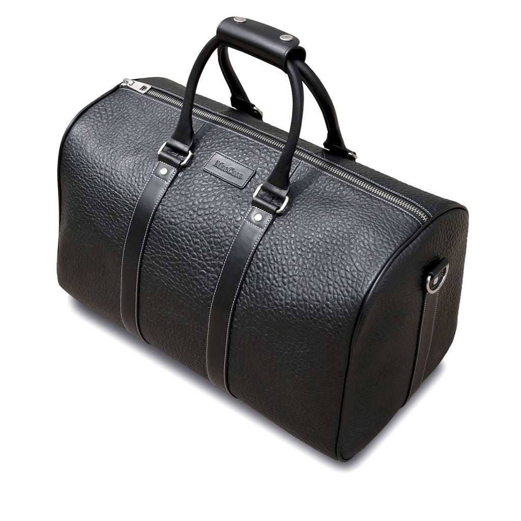 Dual textured hides set this leather duffle bag apart