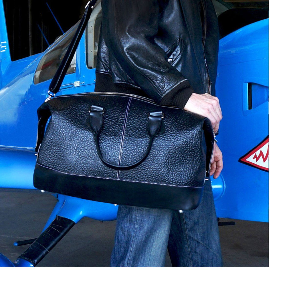 MacCase Premium Leather Overnight Bag shown with the included shoulder strap