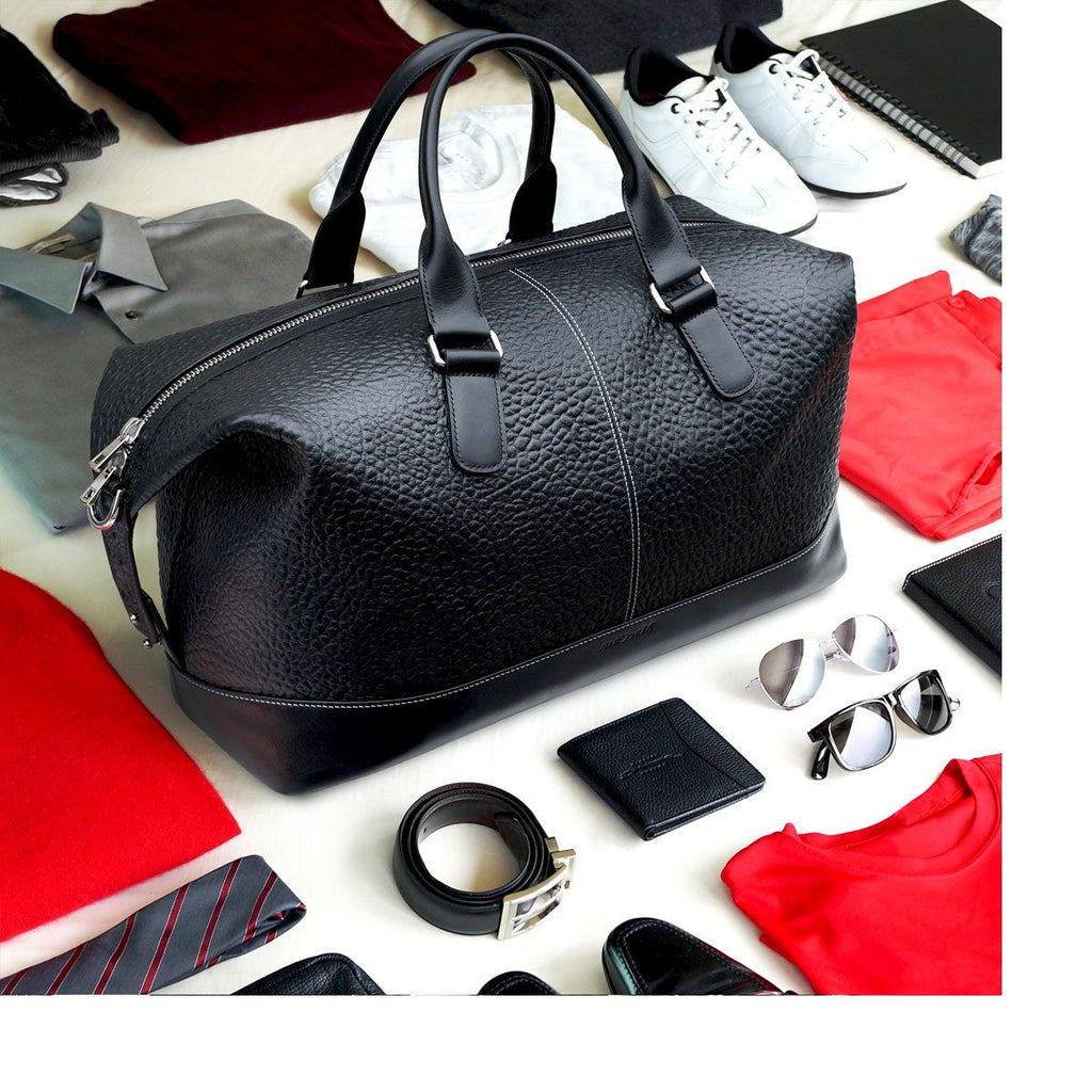 Black Overnight Bag ready to be packed for a getaway