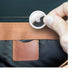 An integrated interior pocket in the Messenger Bag makes your bag Air Tag ready